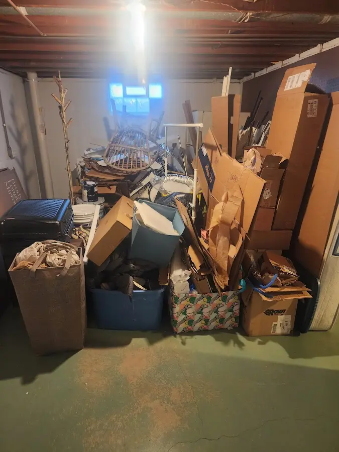 Roll-off dumpster container at job site for Yard Waste Dumpster Rental in Wauna